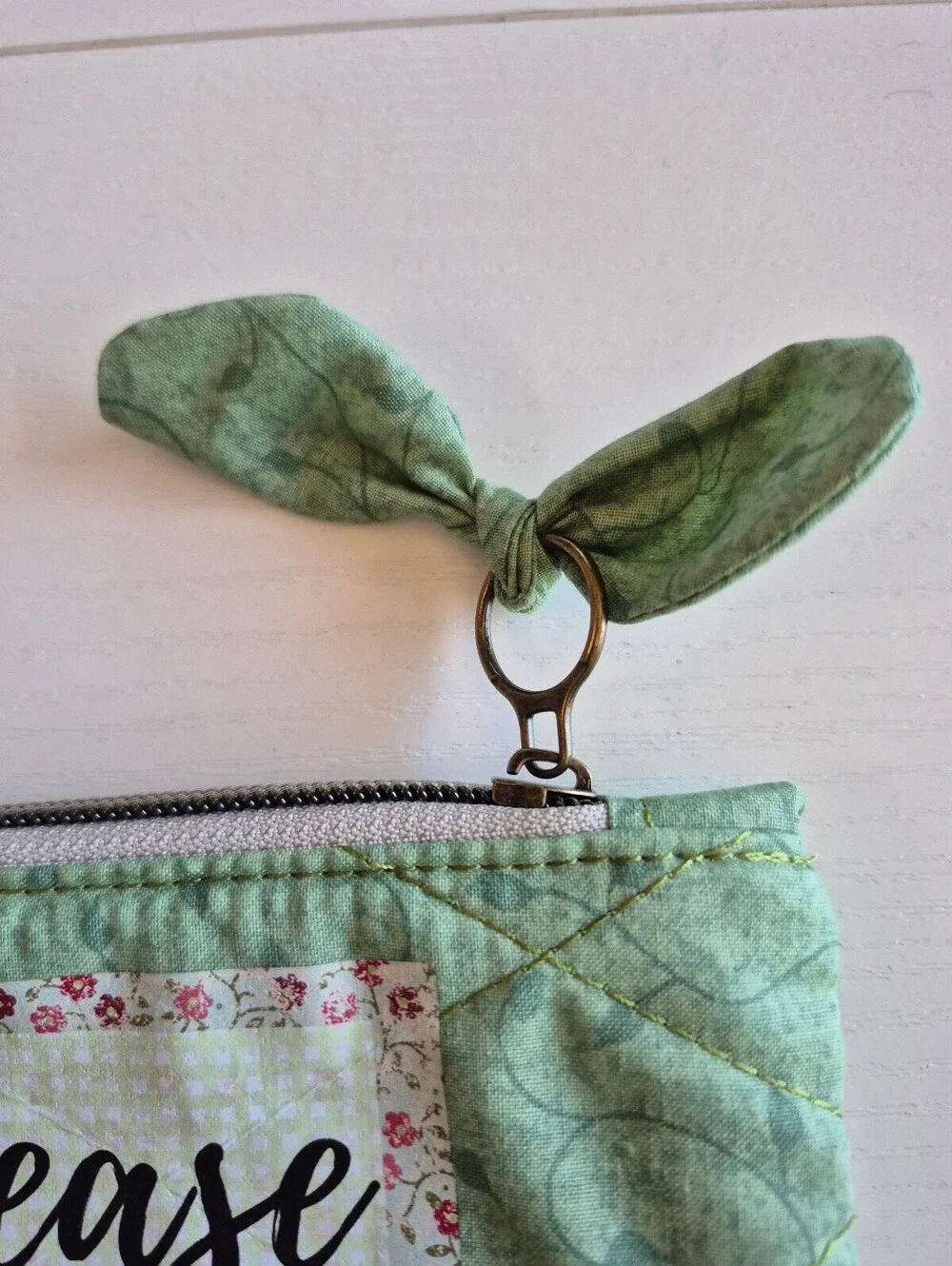 Quilted bow pouch